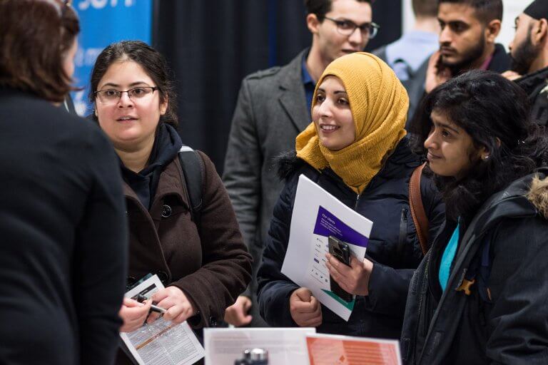 Students connecting with an employer at Connect to Careers