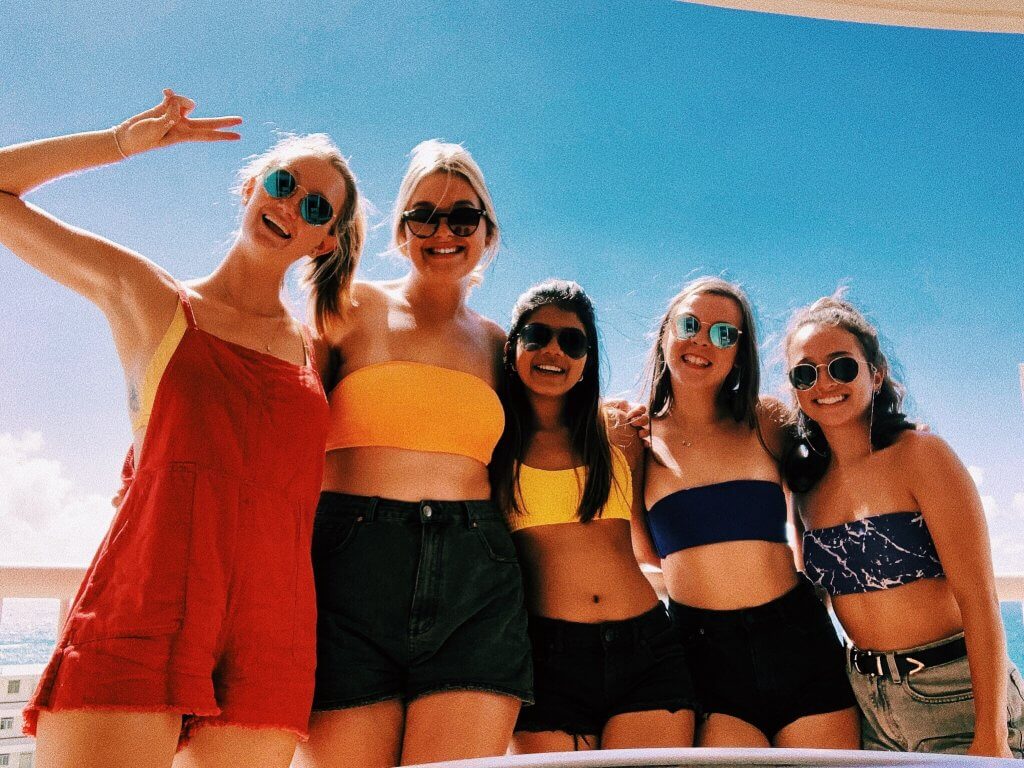 Arianna with friends at the beach