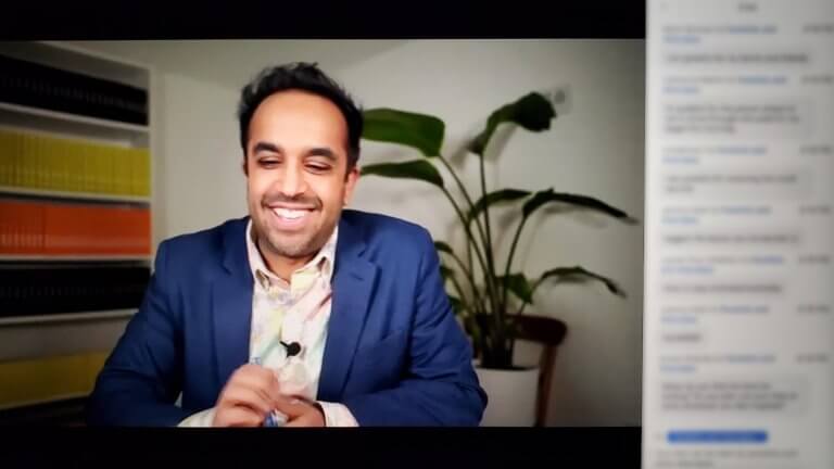 Neil Pasricha smiling in a Zoom virtual event.