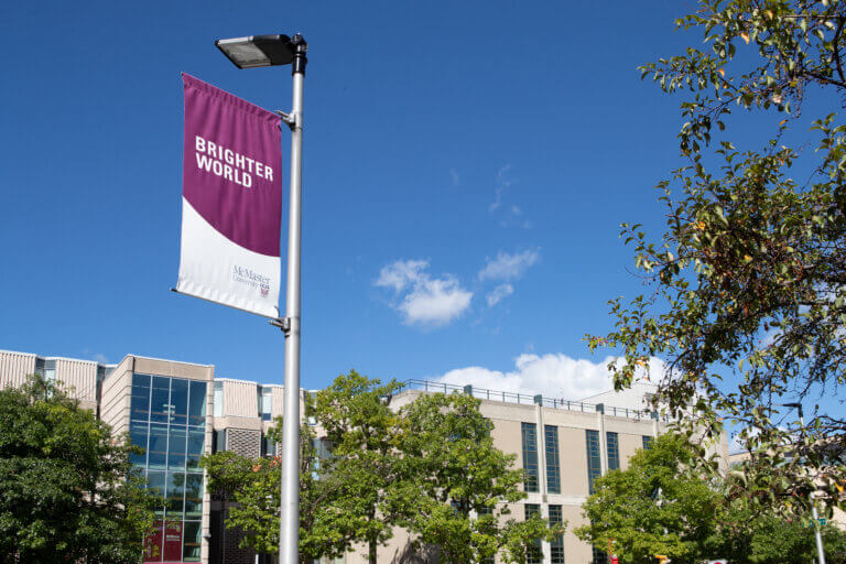 Brighter World Banner on McMaster campus.