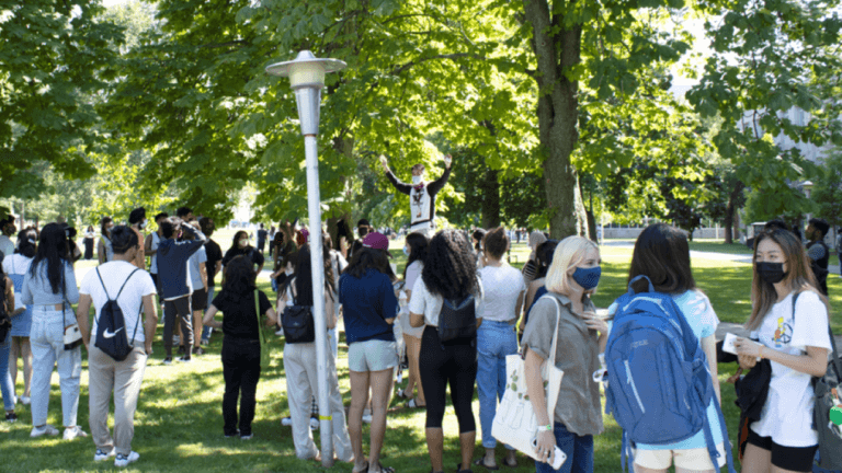 Group of students outside wearing masks during 2021 orientation.
