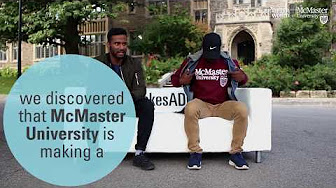 Two McMaster students sitting on the Mac Makes a Difference couch