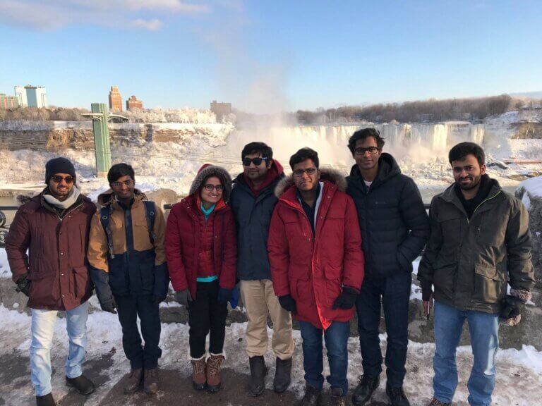 Group of students at Niagara Falls in winter.