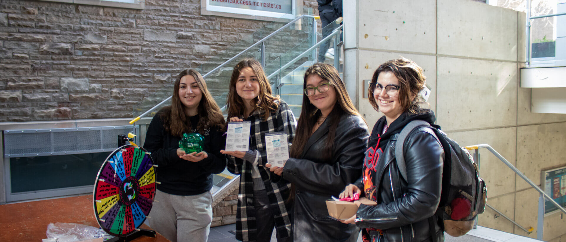 Students at Mac's Money Centre pop-up on campus.