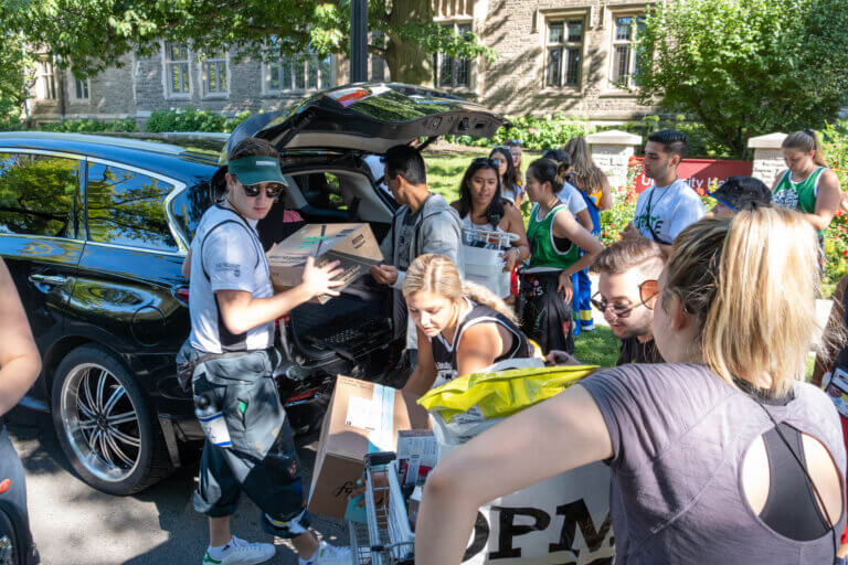 Students helping move-in during Welcome Week